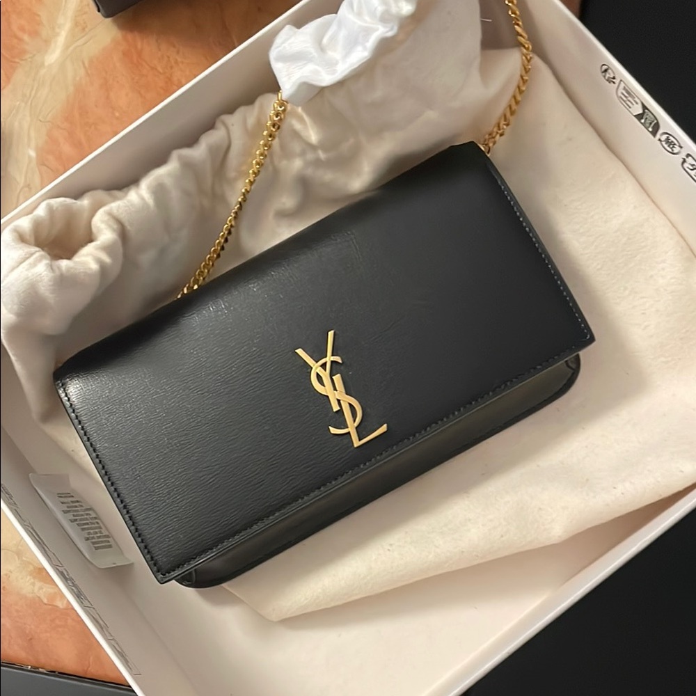 YSL CASSANDRE PHONE HOLDER IN SMOOTH LEATHER